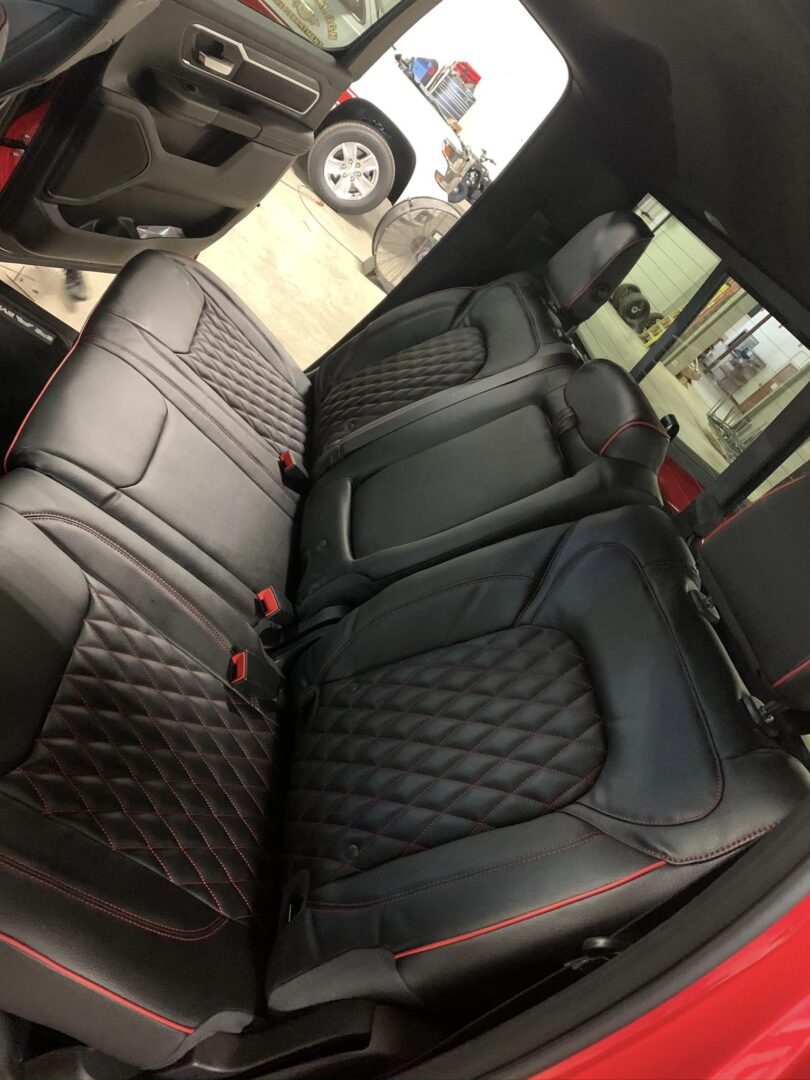 A car seat that is black and red