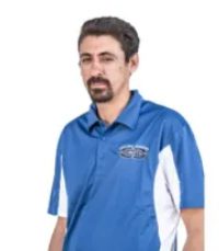Here’s an alt tag for the image: Man in blue and white polo shirt. Car Dealer Team Member