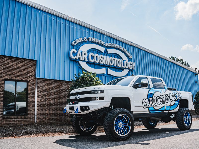 White truck at Car Cosmotology store.