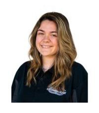Here’s an alt tag for the image: `Smiling woman with long brown hair` Car Dealer Team Member